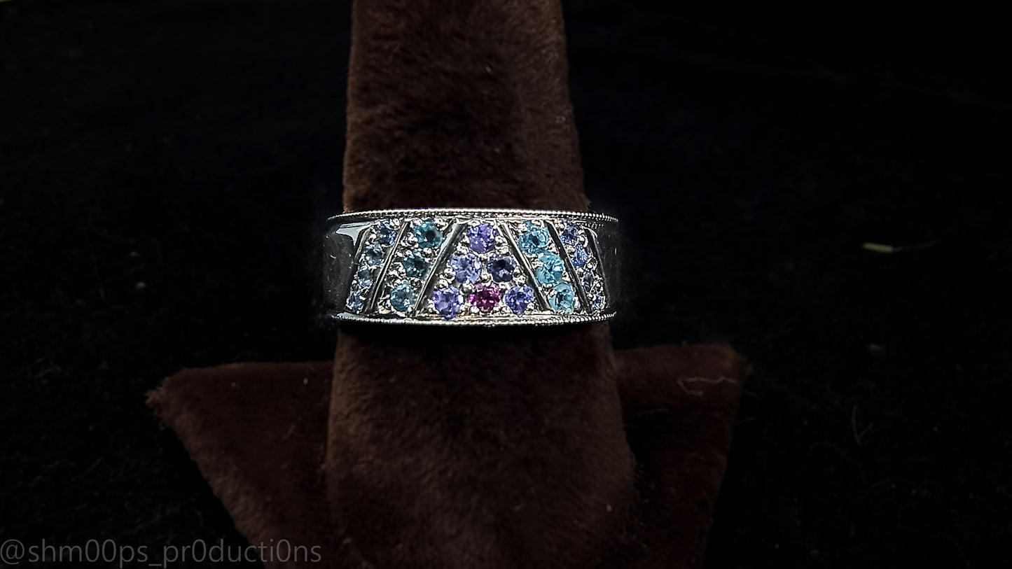 Sterling Silver Tanzanite, Sapphire, Topaz, and Garnet Pave Style ring