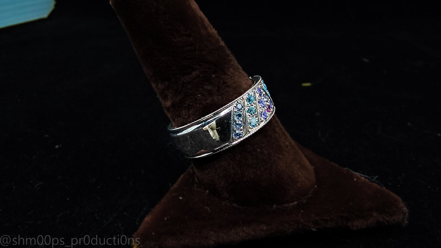 Sterling Silver Tanzanite, Sapphire, Topaz, and Garnet Pave Style ring