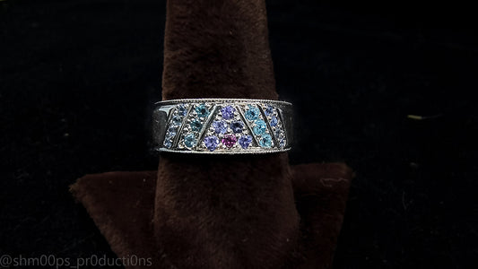 Sterling Silver Tanzanite, Sapphire, Topaz, and Garnet Pave Style ring